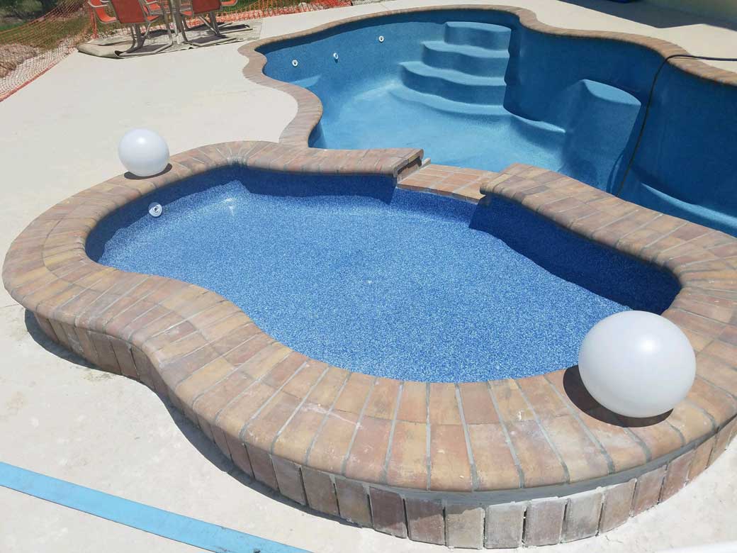 Completed pool by Refreshing Pools & Spas, INTL, LLC