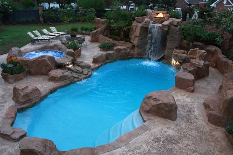 Rock Features for your pool by Refreshing Pools & Spas, INTL, LLC